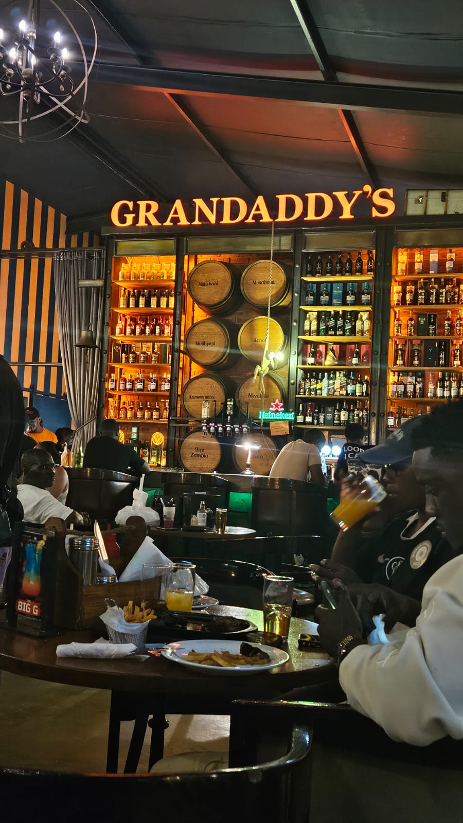 Lusaka — Simon, Grand Daddy's, and One More Benfica Fan in Africa