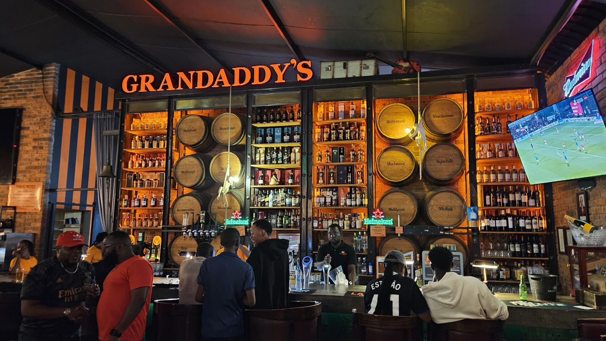Lusaka — Simon, Grand Daddy's, and One More Benfica Fan in Africa