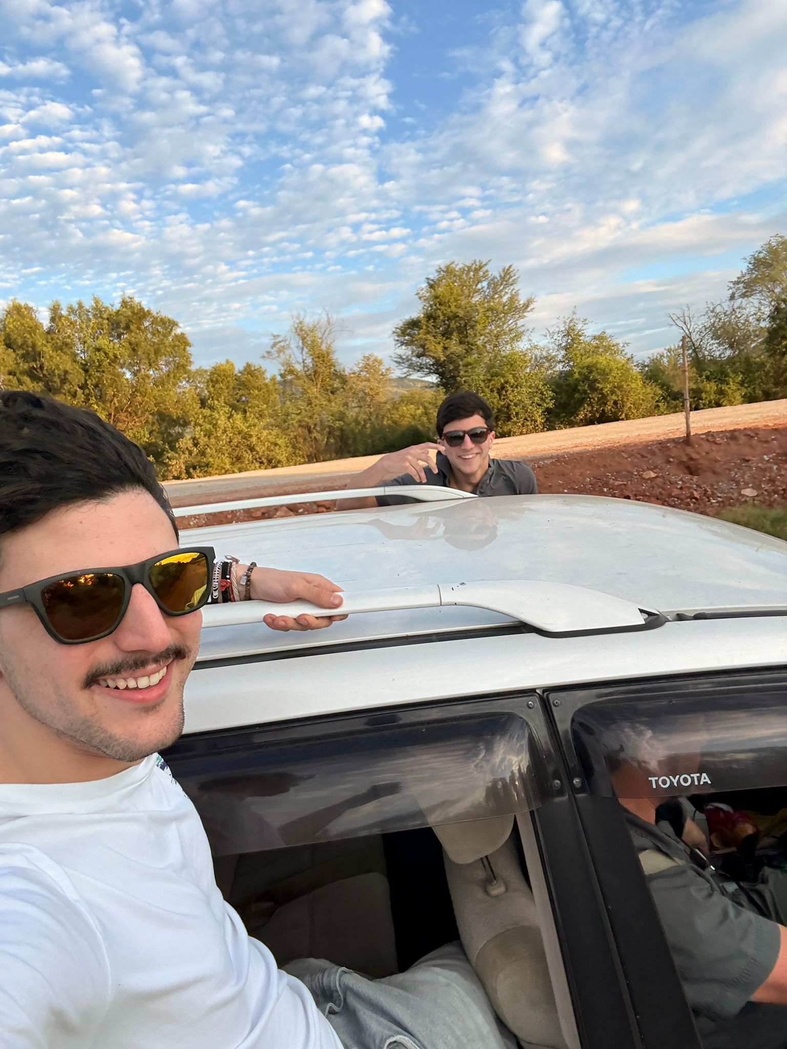 They loved the dirt roads — window seats on the Toyota