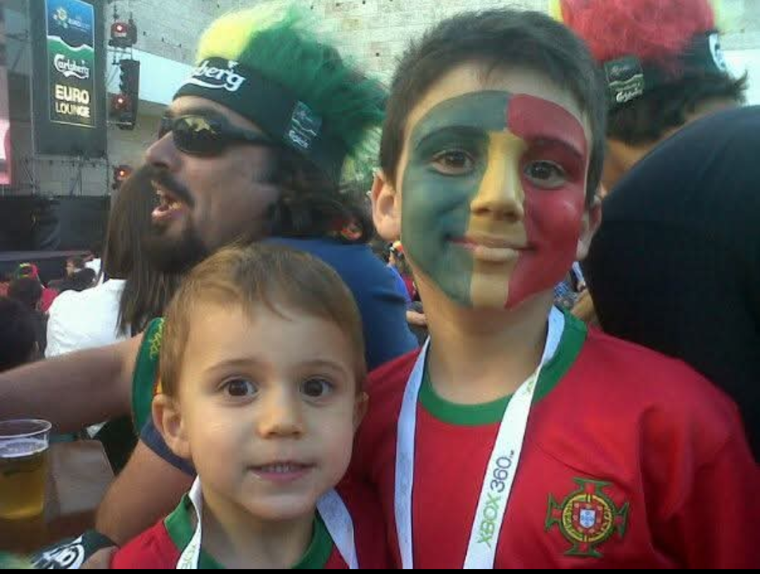 Happy 50th, Gonçalo! 26 years ago we traveled this same road by bus. Here with the boys at a Euro fan zone, back in the day.