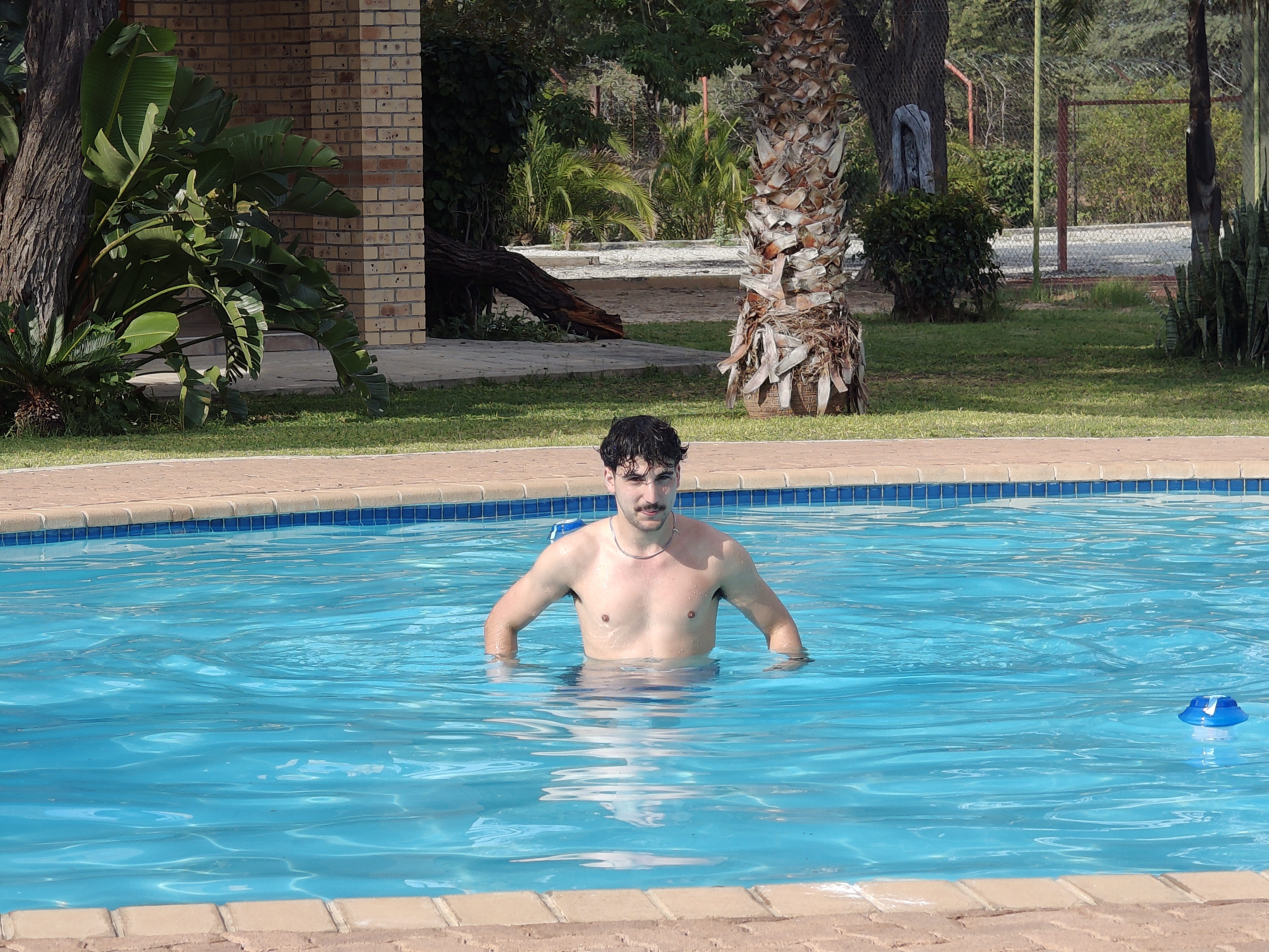Pool time — well deserved after a long drive through the Kalahari