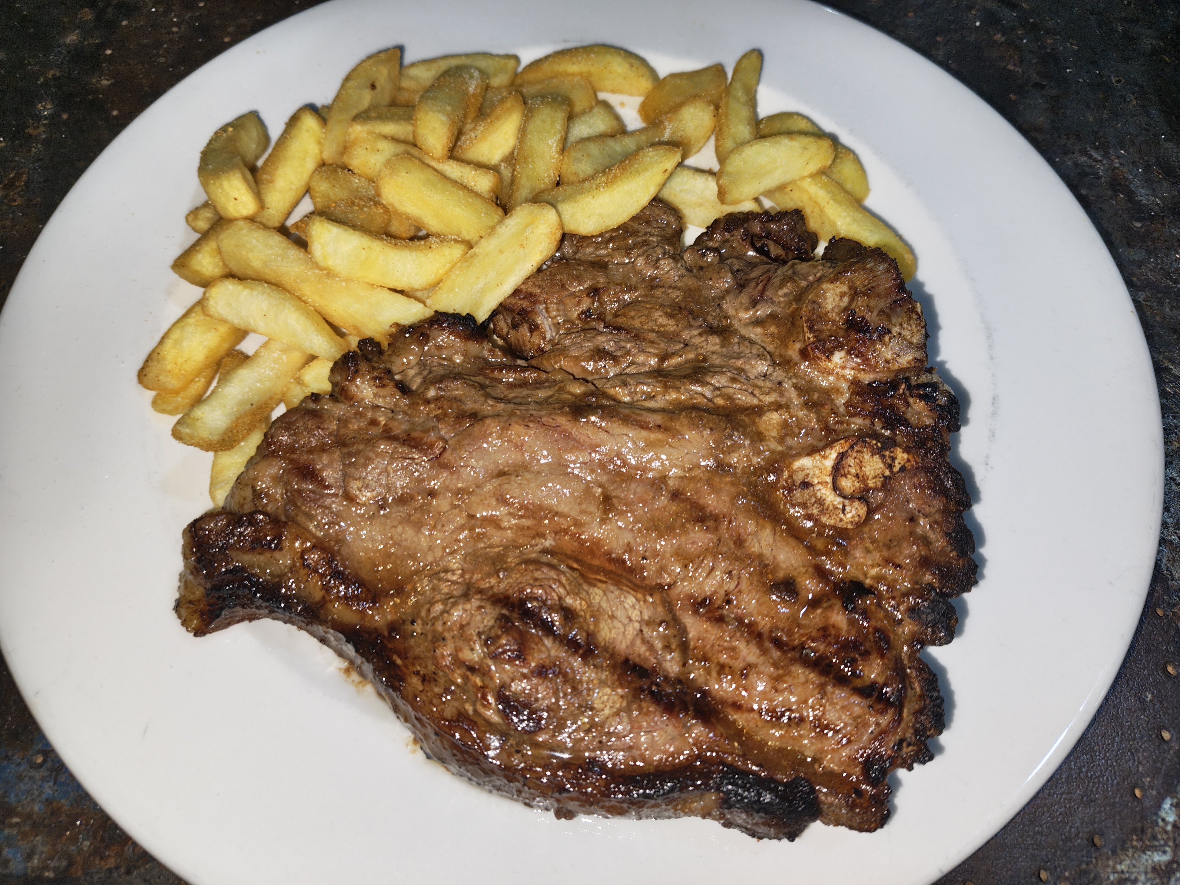T-bone steak in Kang — after seeing hundreds of cows, dinner could only be beef