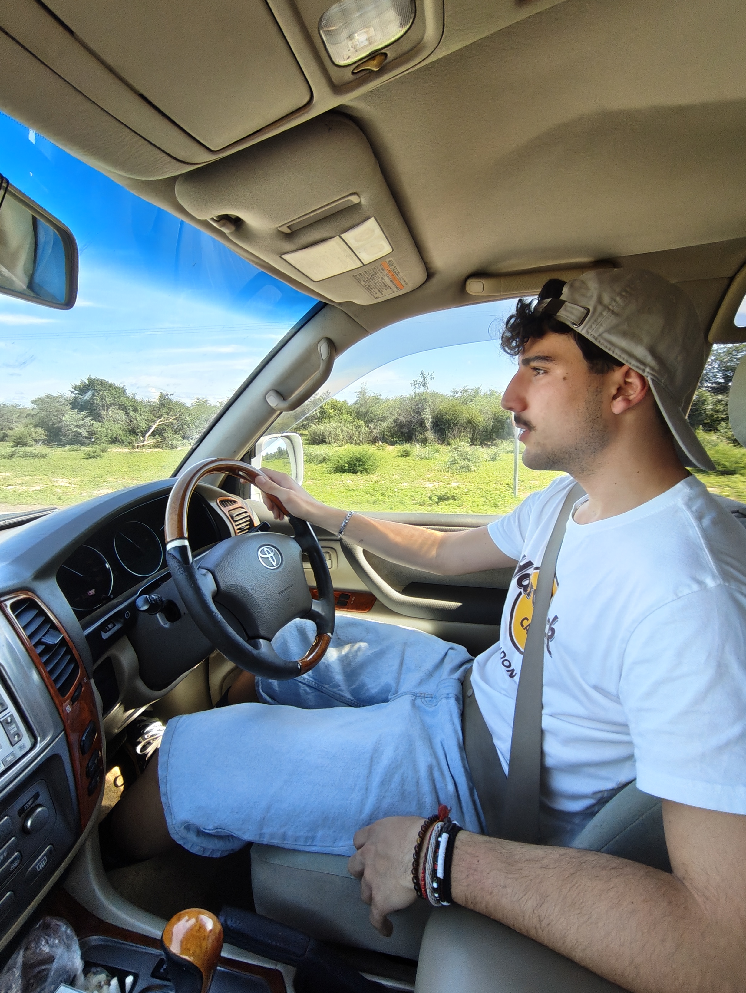 Raul behind the wheel — first time driving on the left side of the road